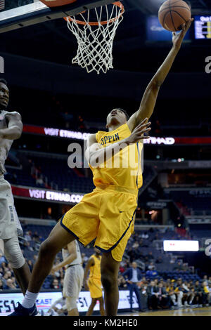 Washington, DC, USA. 3rd Dec, 2017. 20171203 - Coppin State forward CEDRIC COUNCIL (5) scores against Georgetown in the first half at Capital One Arena in Washington. Credit: Chuck Myers/ZUMA Wire/Alamy Live News Stock Photo