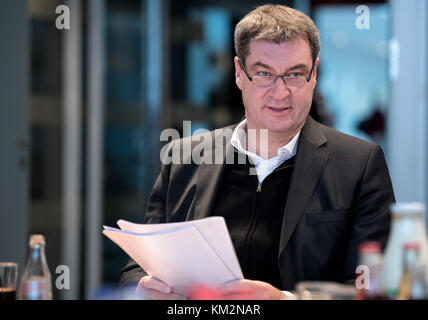 Munich, Germany. 21st Nov, 2017. Bavarian Finance Minister Markus Soeder (CSU) sits in the Bavarian state chancellery on his designated place prior to a cabinet sitting in Munich, Germany, 21 November 2017. The cabinet will discuss the upgrading of internet infrastructure in Bavaria. Credit: Sven Hoppe/dpa | usage worldwide/dpa/Alamy Live News Stock Photo