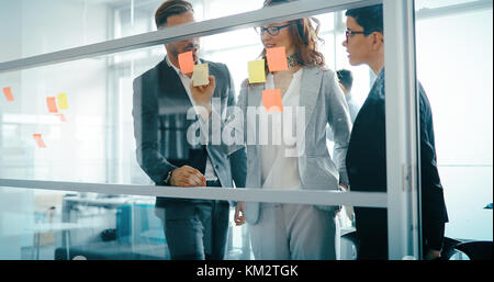 Group of business people collaborating in office Stock Photo