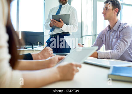 Modern Entrepreneurs Planning Projects in Meeting Stock Photo