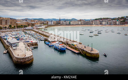 Located at the end of the concha and below mount Urgull, San Sebastian port is very small and always full. Stock Photo