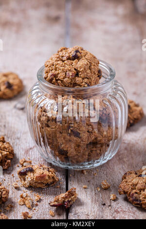 Delicious oatmeal cookies with pecan nuts and dried cranberries Stock Photo