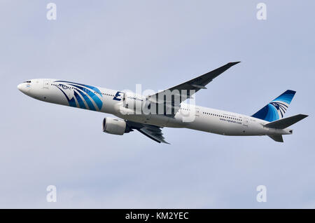 EgyptAir Boeing 777 plane, Heathrow Airport, UK. Boeing 777-36N SU-GDR is seen climbing out after take-off. Stock Photo
