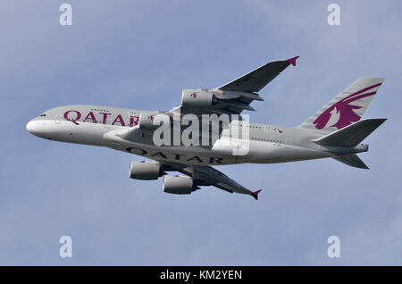 Qatar Airways Airbus A380, Heathrow Airport, UK. Airbus A380-861 A7-APC is seen climbing out after take-off. Stock Photo