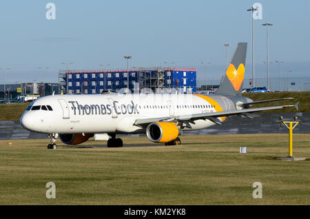 Airbus A321, Thomas Cook Airlines, Birmingham Airport, UK. Airbus A321-211 G-TCDY is seen taxiing to take-off. Stock Photo
