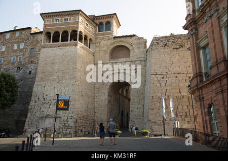 Monumental Etruscan Arch from III-century BC restored by Augustus in I-century BC and now called Augustan Arch (Arch of Augustus) is one of the seven  Stock Photo