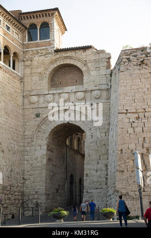 Monumental Etruscan Arch from III-century BC restored by Augustus in I-century BC and now called Augustan Arch (Arch of Augustus) is one of the seven  Stock Photo