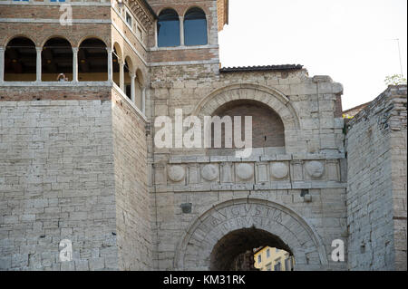 Monumental Etruscan Arch from III-century BC restored by Augustus in I-century BC and now called Augustan Arch (Arch of Augustus) is one of the seven  Stock Photo