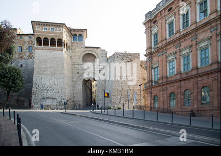 Monumental Etruscan Arch from III-century BC restored by Augustus in I-century BC and now called Augustan Arch (Arch of Augustus) is one of the seven  Stock Photo