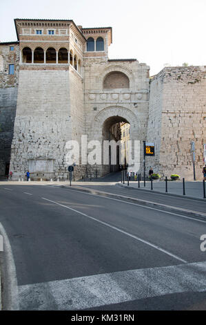 Monumental Etruscan Arch from III-century BC restored by Augustus in I-century BC and now called Augustan Arch (Arch of Augustus) is one of the seven  Stock Photo