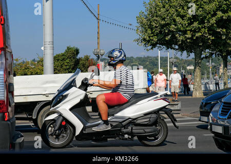 Geneva, Switzerland - August 30, 2016: Biker on Motorbike on the road in Switzerland. Stock Photo