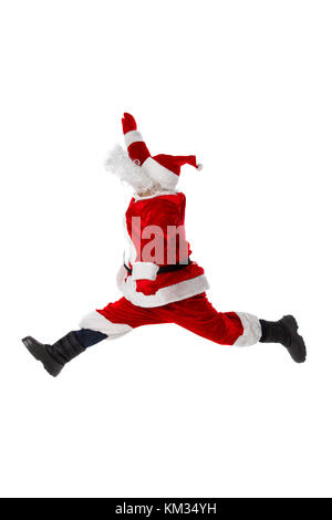 Santa Claus is jumping. Isolated on white. Authentic Santa Claus. Stock Photo