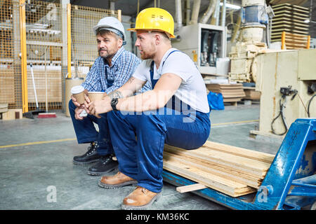 Construction Workers on Coffee Break Stock Photo