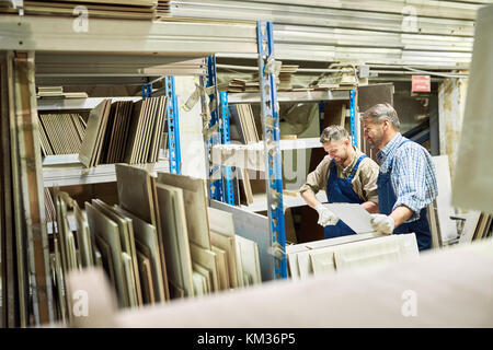 Workers in Warehouse Stock Photo