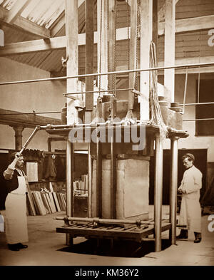 Pressing a bale of linen, linen production, Victorian period Stock Photo