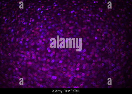 Abstract festive purple bokeh background Stock Photo