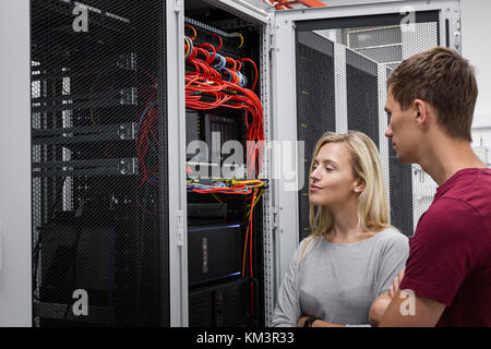 team of busienss people working in server room Stock Photo