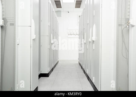 White Server Room Network/communications server cluster in a server room Stock Photo