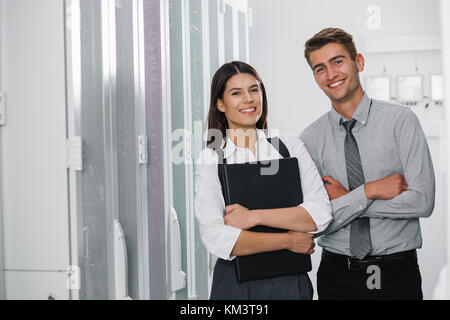 team of busienss people working in server room Stock Photo