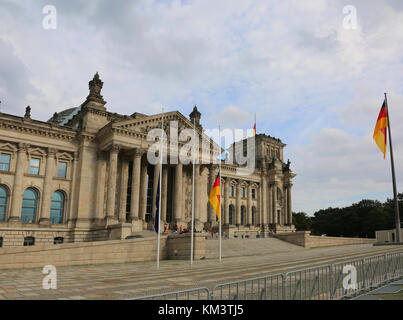 Berlin, Germany - August 18, 2017: Reichstag building is Parliament of Germany in Berlin. The big dedication DEM DEUTSCHEN VOLKE on the main gate mean Stock Photo