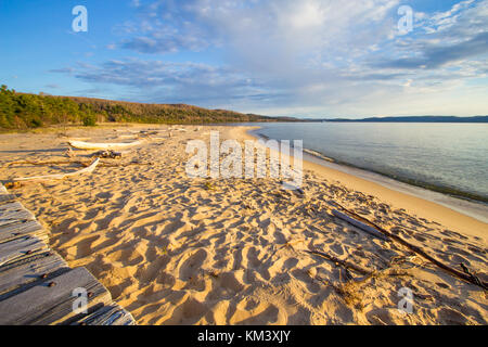 Summer Beach Panorama. Wide sandy beach on the shores of Lake Superior on a sunny summer day in Pictured Rocks National Lakeshore in Michigan. Stock Photo