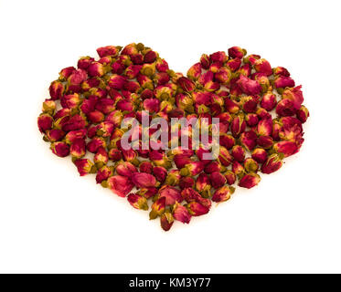 Heart shape made of rosebuds flowers isolated on white background - love symbol concept Stock Photo