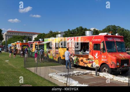 A line of fast food food trucks on the National Mall, Washington DC, United States. Stock Photo