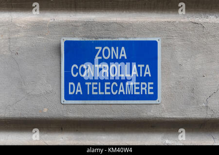 This area is under video surveillance sign in italian language Stock Photo