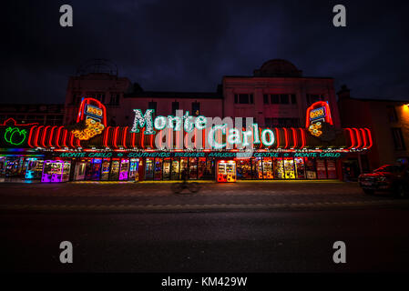 Southend on Sea seafront lights and amusement arcade at night. Monte Carlo amusements Stock Photo