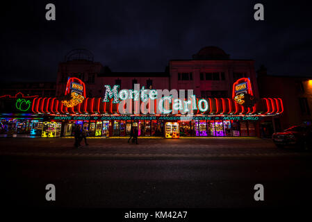 Southend on Sea seafront lights and amusement arcade at night. Monte Carlo amusements Stock Photo