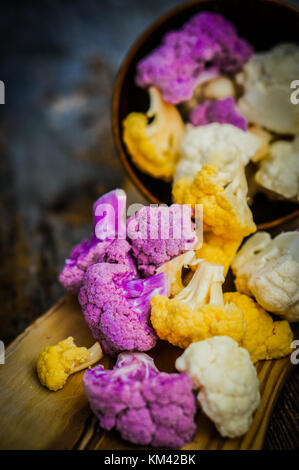Colorful Cauliflower On Rustic Background Stock Photo