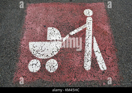 Parents with prams sign Stock Photo