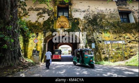 Galle, Sri Lanka - Sep 9, 2015. People and vehicles on road in old town of Galle, Sri Lanka. Galle had been a prominent seaport long before western ru Stock Photo