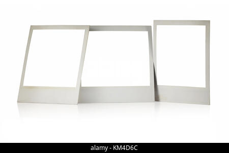 Set of three Polaroid frames with blank squares standing isolated against white background Stock Photo