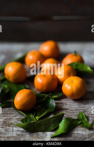 Tangerines in low key Stock Photo