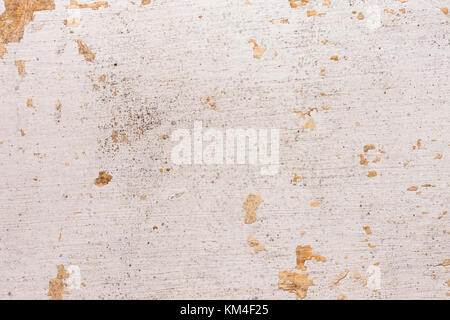 Chipped paint on old wall background - Old cement plastered wall that has chipped paint. Stock Photo