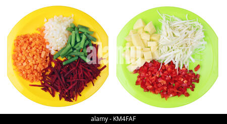 The basis of lean vegetarian soup is finely chopped fresh vegetables. Isolated on white kitchen concept Stock Photo