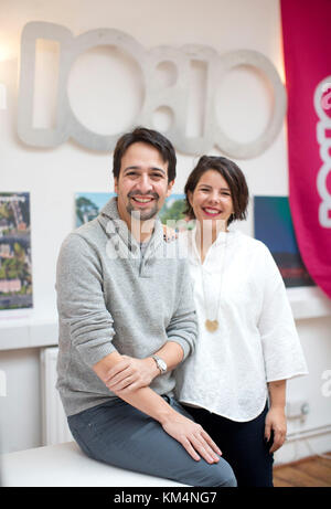 American actor and composer Lin-Manuel Miranda, creator of the hit musical Hamilton, and his wife Vanessa Nadal visit the headquarters of the show's charity partner 10:10 in London ahead of its opening at the Victoria Palace Theatre on December 6. PRESS ASSOCIATION. Picture date: Monday December 4, 2017. Photo credit should read: Isabel Infantes/PA Wire Stock Photo