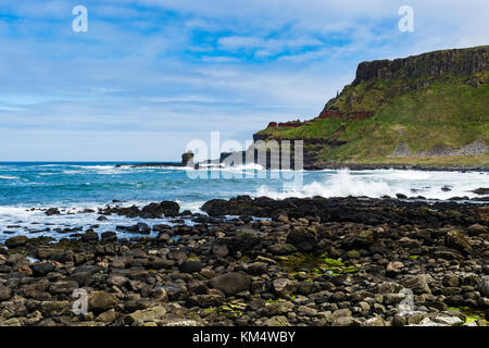 Northern Ireland: View towards the Chimney Stacks part of Giant's Causeway nature reserve on the Atlantic ocean coastline. Stock Photo