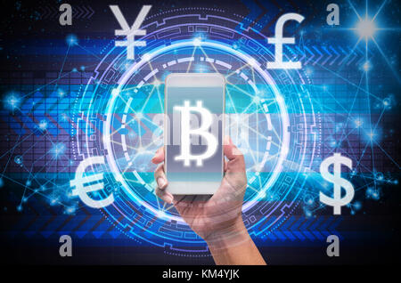 holding smart phone showing the financial technology with block chain over the innovation technology virtual screen on part of earth with the star, El Stock Photo