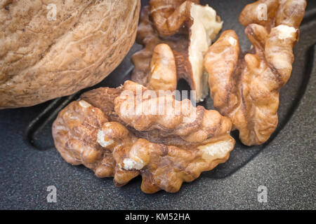 Shelled walnuts on the table. Stock Photo