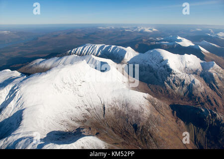 An aerial view of Nevis Range in Winter clearly showing the summits of Aonach Mor, Aonach Beag, Carn Mor Dearg and Ben Nevis, Britain's highest summit Stock Photo