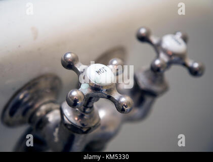 Vintage faucet set on a bathtub Stock Photo