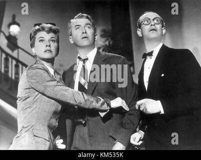THE MAN WHO KNEW TOO MUCH 1956 Paramount Pictures film with from left: Doris Day, James Stewart, Richard Wattis Stock Photo