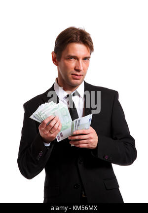 Image of businessman in suit with euro at hands Stock Photo