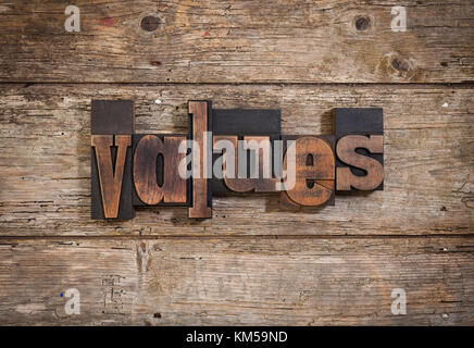 values, single word set with vintage letterpress printing blocks on rustic wooden background Stock Photo