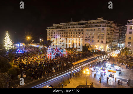 Thessaloniki, Greece - November 30, 2017: Crowd of people in Aristotle's square in Thessaloniki sees the Christmas tree during the Christmas Period.   Stock Photo