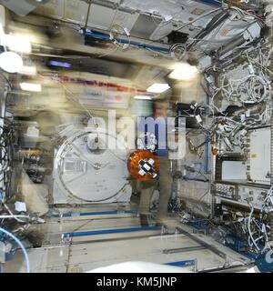 International Space Station, Earth Orbit. 04th Dec, 2017. Expedition 53 American astronaut Joe Acaba during a test of the Zero Robotics student project aboard the International Space Station December 4, 2017 in Earth Orbit. Zero Robotics is a robotics programming competition for High School and Middle School students using SPHERES satellites inside the International Space Station. Credit: Planetpix/17�Թ����� Live News Stock Photo
