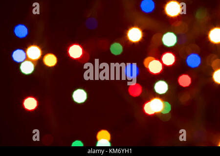 Blurry multicolored spherical lights on black, can use background Stock Photo
