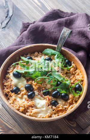 Bowl of tomato, olive and mozzarella rice Stock Photo